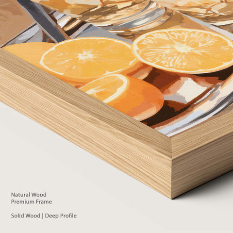 Artwork of oranges and drinks glasses on a tray in a natural wood frame.