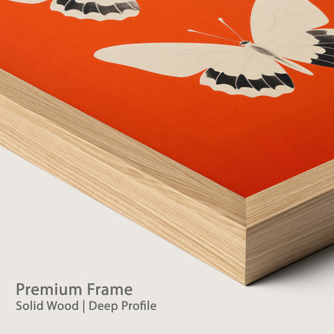 Framed butterfly artwork with a premium natural wood frame.