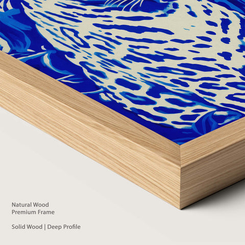 Framed artwork of a blue leopard in a natural wood frame.