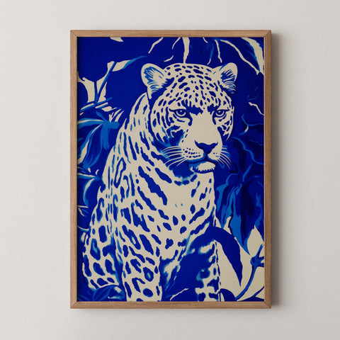 Bold blue leopard wall art print titled Electric Leopard featuring stylized animal illustration with striking contrast.