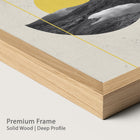 Close-up of a premium natural wood frame with a mountain landscape print.