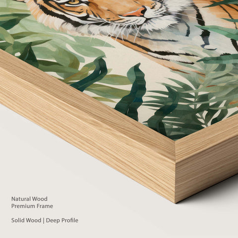 Framed artwork of a tiger among leaves with a natural wood frame.
