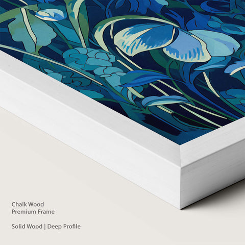 Artwork with blue and green floral design in a chalk wood frame.