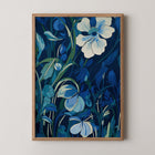 Floral wall art print titled Midnight Bloom featuring deep blue flowers and botanical details in a moody palette.