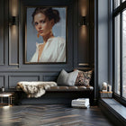 Modern living room with a painting art print of a woman on the wall, a sofa with decorative pillows, and large windows.