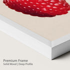 Close-up of a premium chalk wood frame with a raspberry artwork.