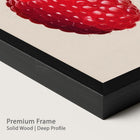 Close-up of a premium onyx wood frame with a raspberry artwork.