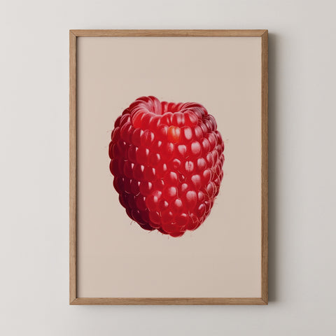 Framed art print of a red raspberry on a beige background
