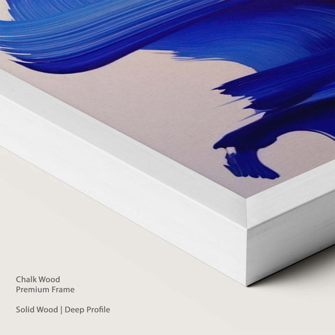 Chalk wood framed artwork with blue brush strokes.