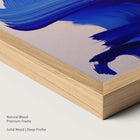 Natural wood framed artwork with blue brush strokes.