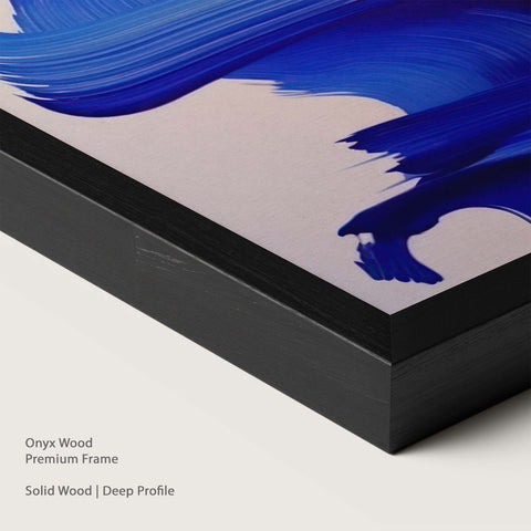 Onyx wood framed artwork with blue brush strokes.