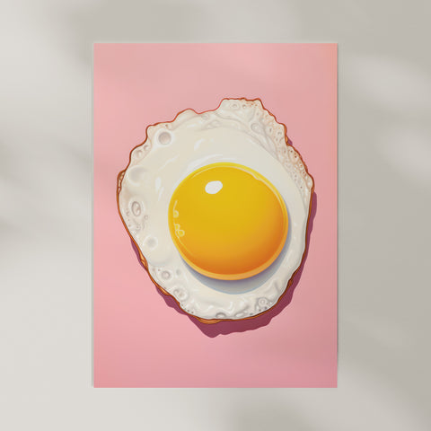 Art print of a fried egg on a pink background