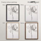 Four monochrome floral artworks with black, white, oak and walnut frames , featuring 'thisARTSyours' branding.