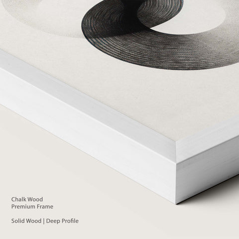 Chalk wood frame with monochrome abstract artwork.