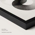 Onyx wood frame with monochrome abstract artwork.