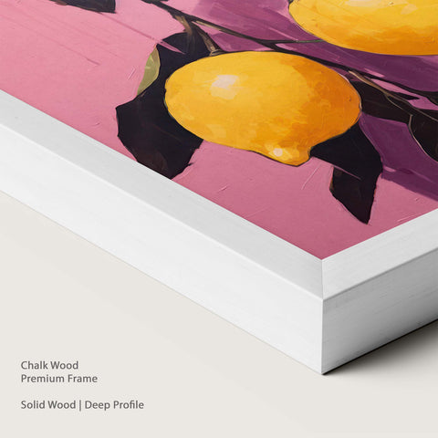 Artwork of lemons on a pink background within a chalk wood frame.