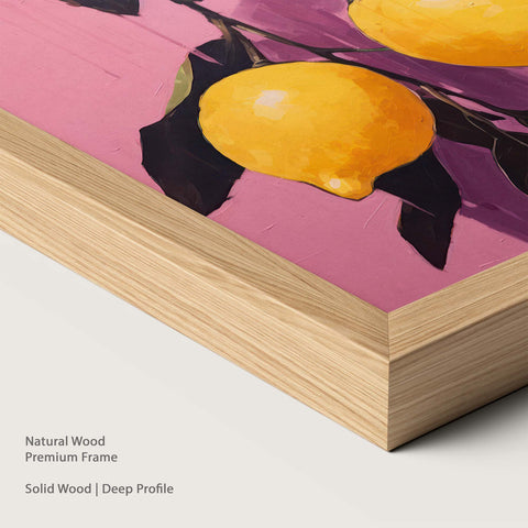 Artwork of lemons on a pink background within a natural wood frame.